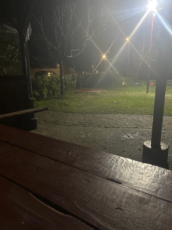 Nighttime playground scene captured in Trud, Bulgaria