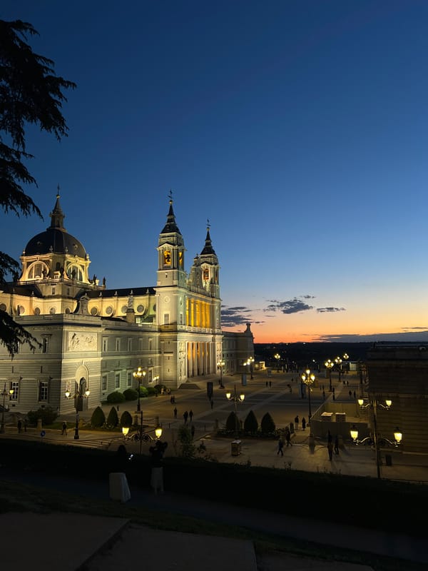 Almudena Cathedral illuminated at dusk in Madrid