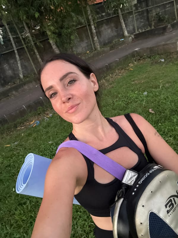Outdoor fitness training session in North Kuta field