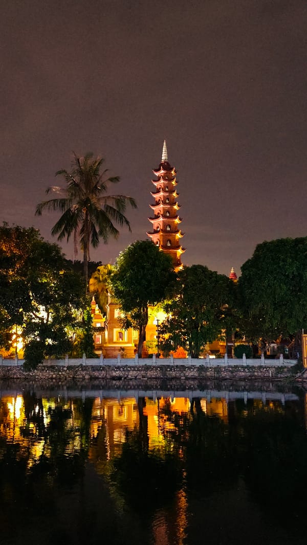 Hanoi at night: lakeside landmarks and a luxury hotel