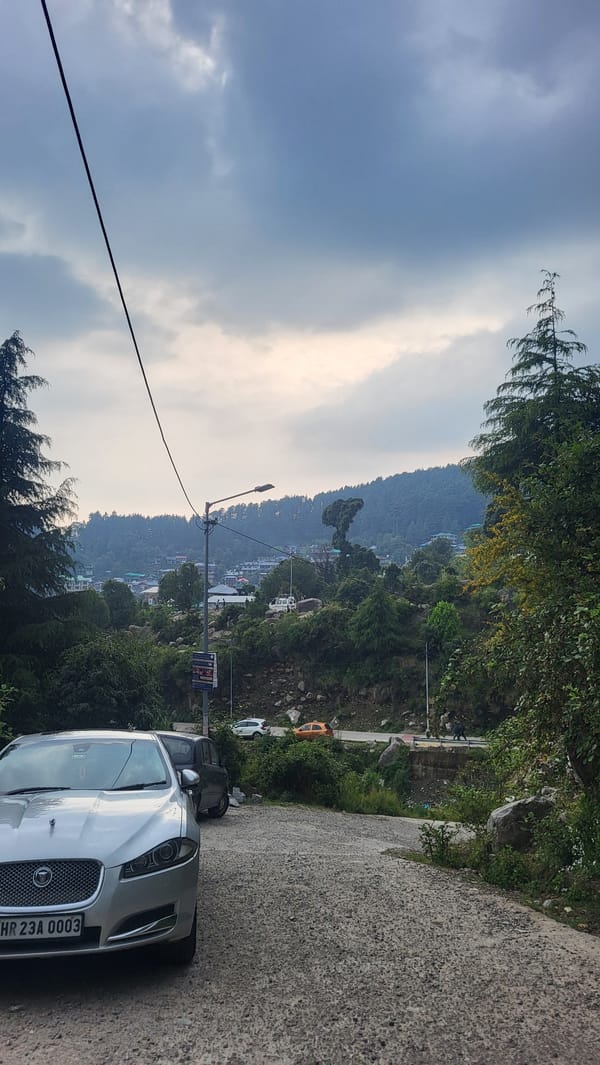 Silver Jaguar spotted on mountain road in Haini, India