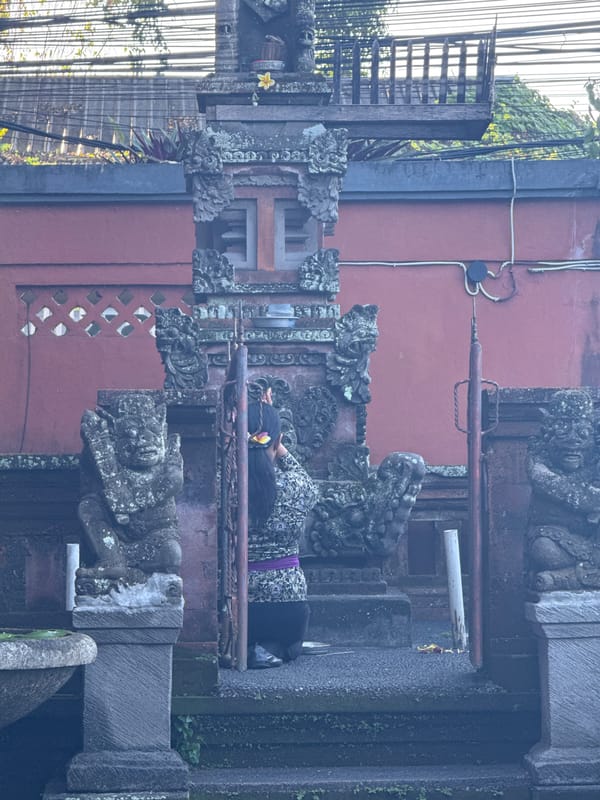 Evening temple prayers and volleyball in Peliatan, Indonesia