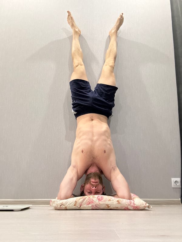 Man completes morning workout routine at home in Saint Petersburg