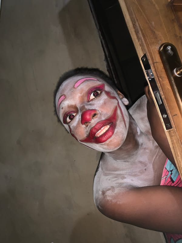 Person in clown makeup documented in Agban, Nigeria