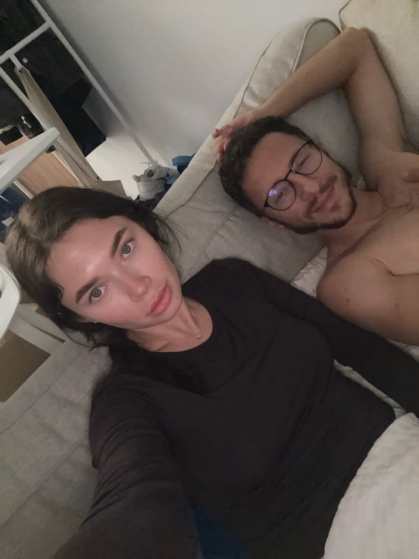 Two people rest on furniture in Livadia Larnakas