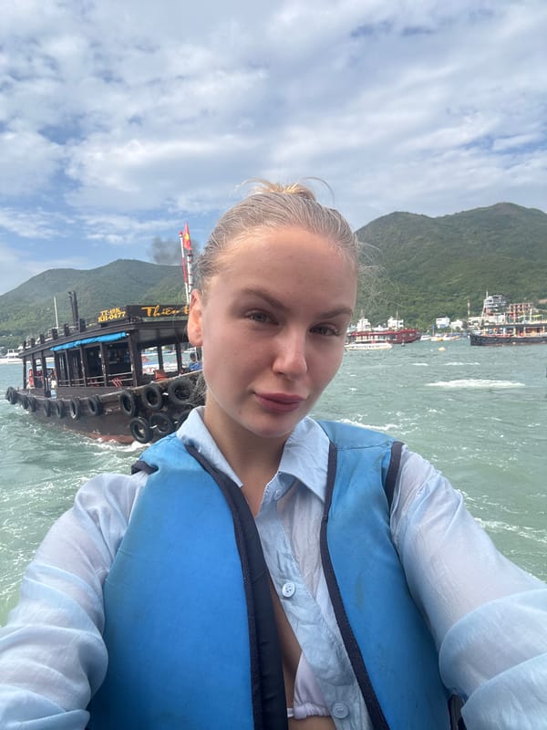 Boat tour and harbor activity in Nha Trang's busy bay