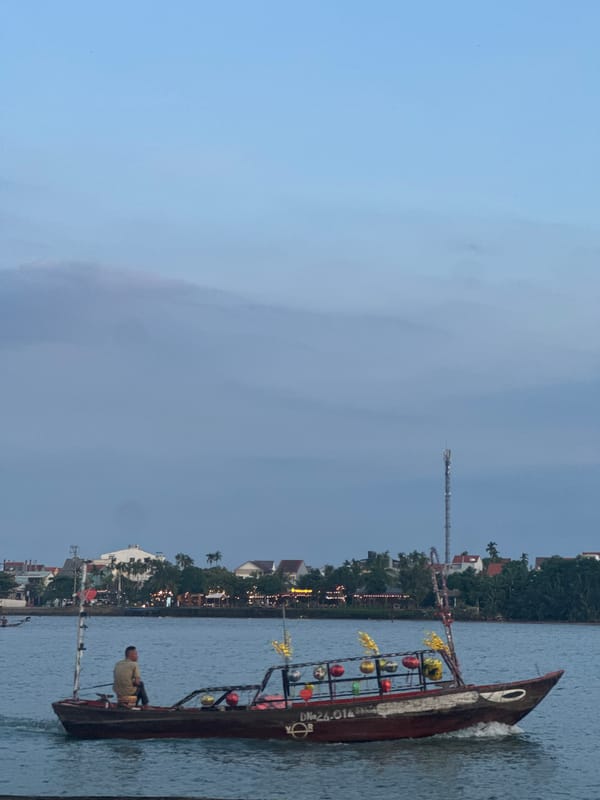 Evening boat activity and street scenes documented in Hội An