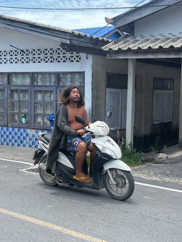 Choeng Thale neighborhood snapshot: streets, scooters, and odd details