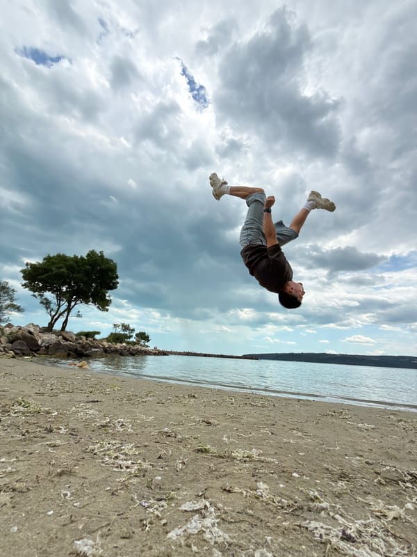 Man performs beach acrobatics in Varna, Bulgaria