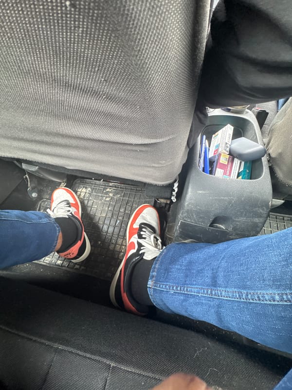 Two passengers photographed inside vehicle in Bulgarian town