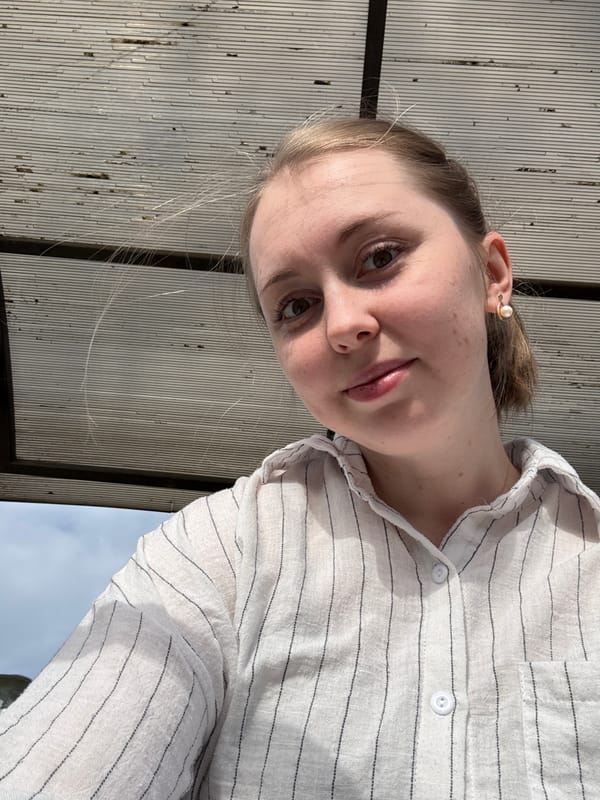 Person observed in urban park with fountain, May 14
