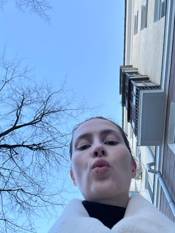 Woman takes selfie outdoors in Yekaterinburg, Russia