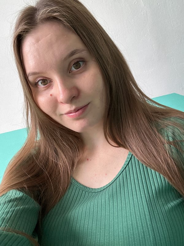 Selfie series in Chaikovsky, green ribbed top, car and outdoors