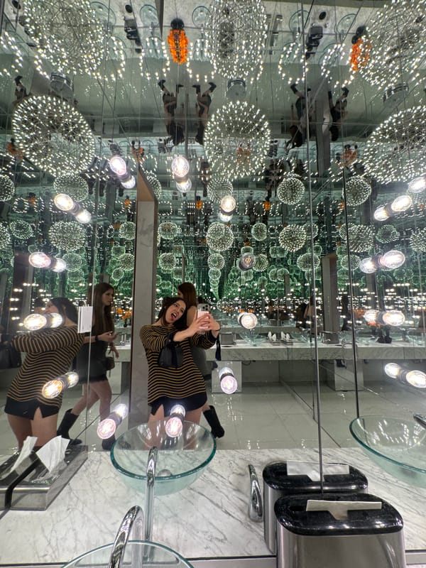 Visitors capture selfies in infinity mirror room in Puebla