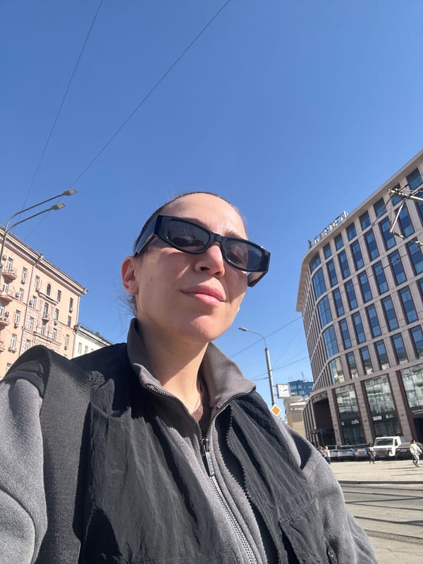 Woman photographed on Moscow street in casual moment