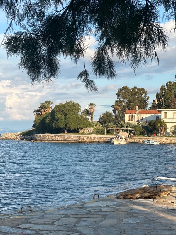 Children spotted on stone waterfront walkway in Datça, Turkey