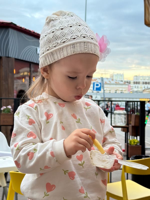 Toddler's afternoon at an outdoor café-playground in Ufa