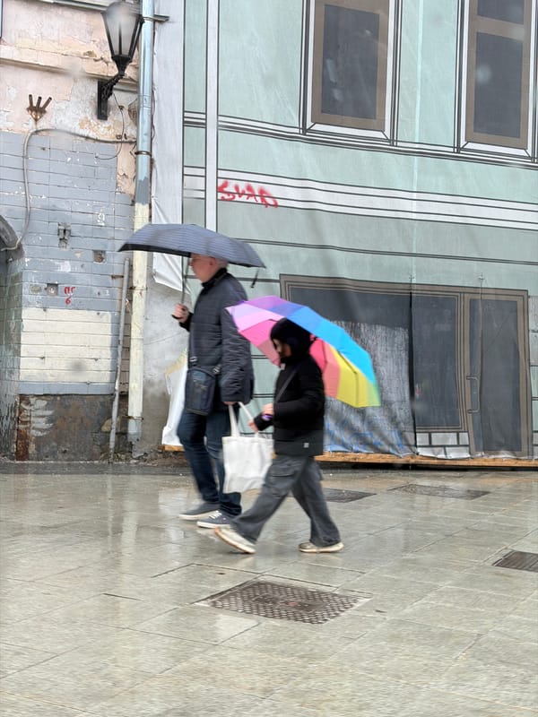 Rainy afternoon scenes documented across Moscow locations
