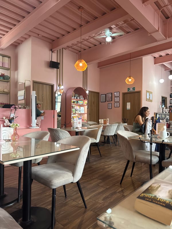 Evening café visit documented in pink-themed Puebla restaurant