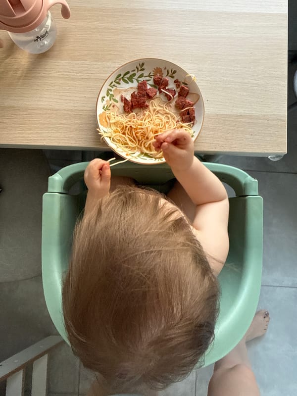 Baby makes messy meal of spaghetti in Moscow