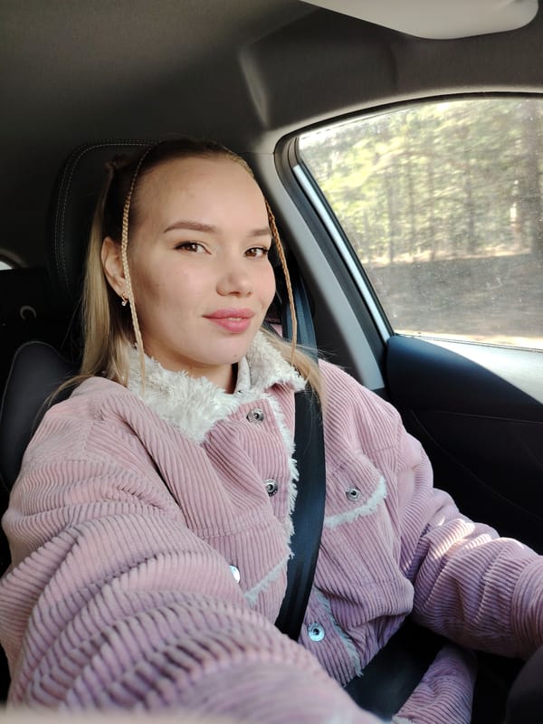Woman takes selfie in car in Chaikovsky, Russia