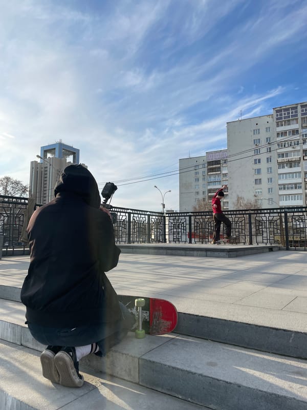 Skateboarding session documented in Yekaterinburg with photographer present