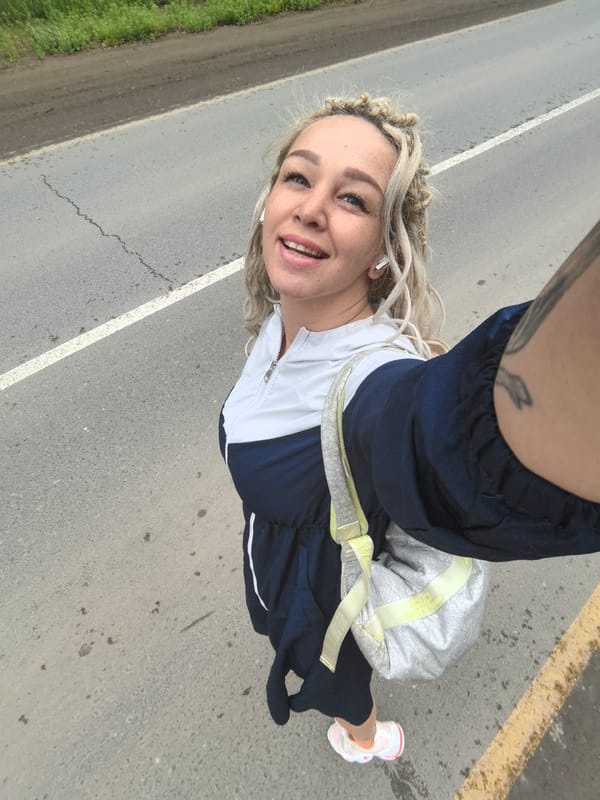 Hitchhiking on a roadside in Noviy, Russia
