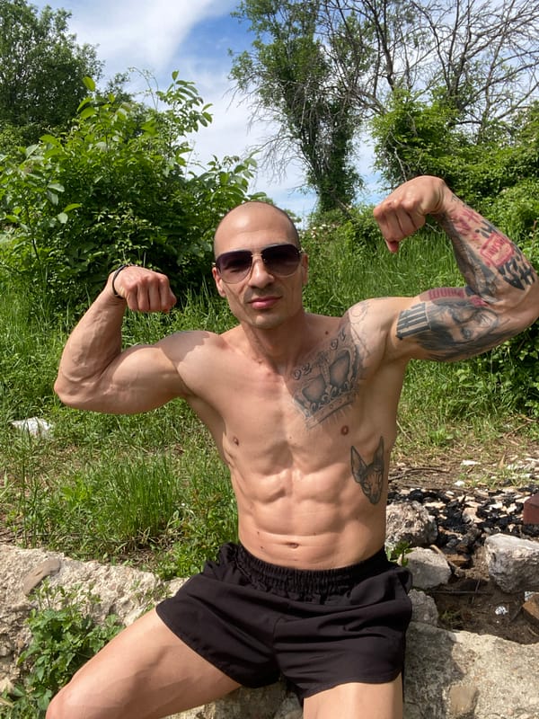 Tattooed man poses outdoors in Pleven, Bulgaria