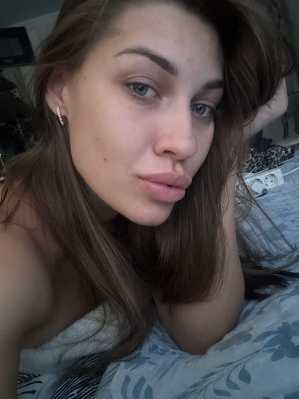 Portrait photograph captured in bedroom setting, Irkutsk