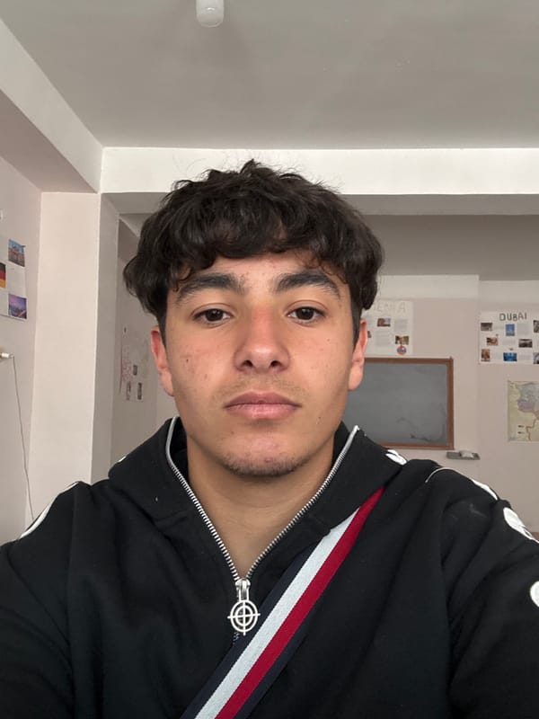 Young men take selfies in downtown Yerevan