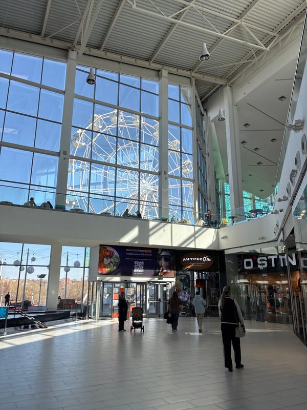 Casual scenes documented around Ulyanovsk waterfront and shopping district