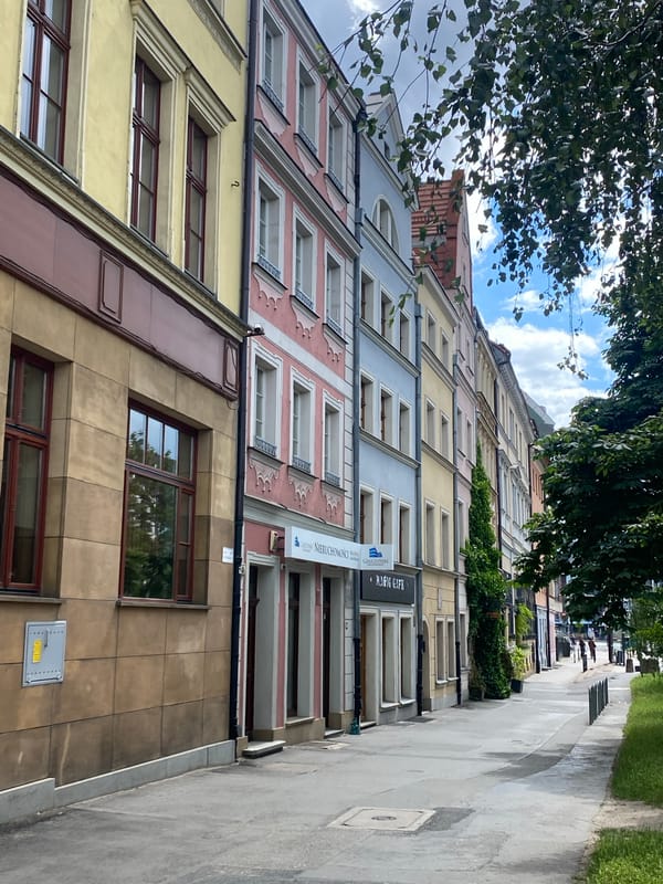 Tourist documents Wrocław Old Town landmarks and bronze dwarves