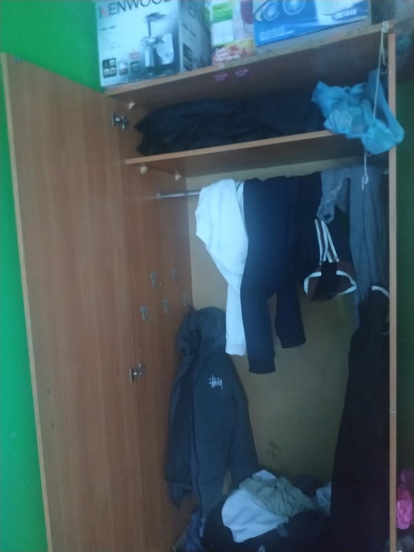 Inside a Russian barracks room on a summer afternoon