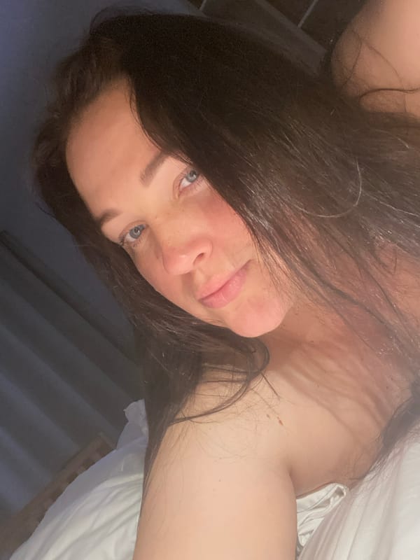 Woman enjoys wine and relaxation during hotel stay in Sochi