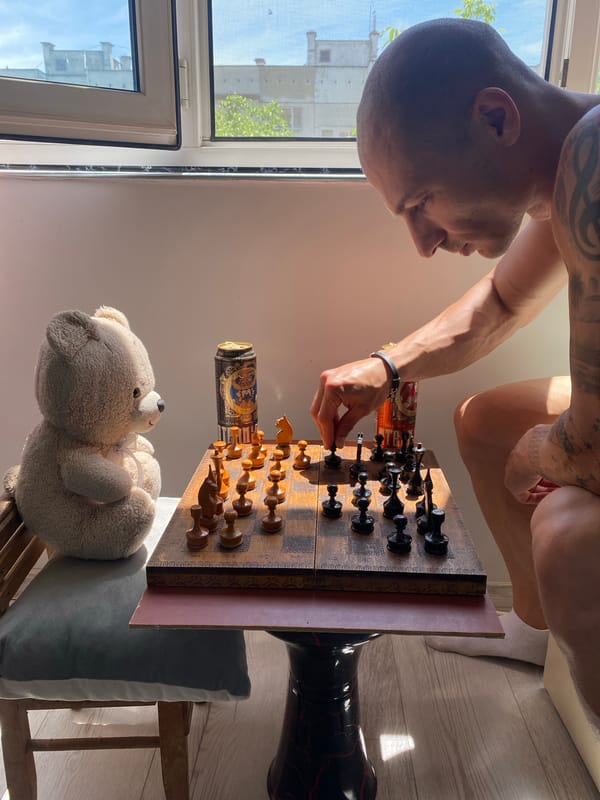 Man plays chess with teddy bear companion in Pleven