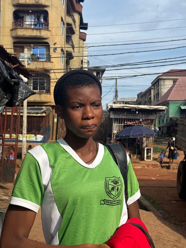 School kids on the streets of Onitsha mid-afternoon