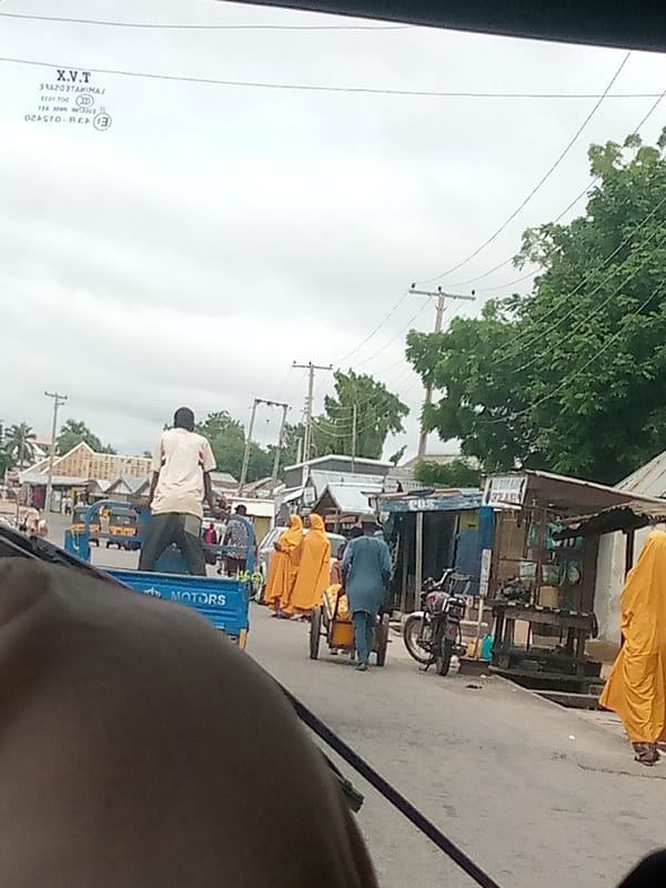 Daily life documented across Jalingo Nigeria markets and streets