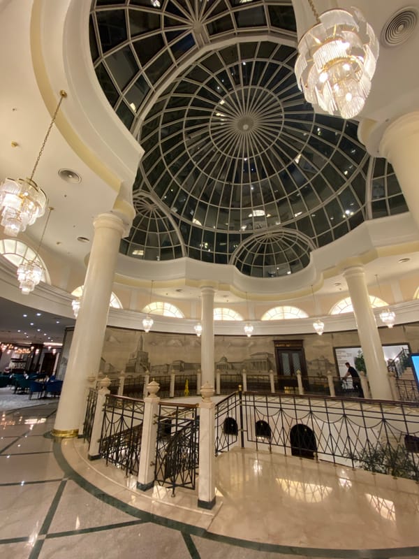 Tourist documents Hotel Metropol's ornate lobby and atrium spaces