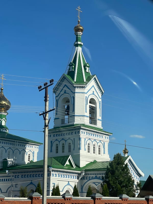 Church and greenhouse scenes documented in Перевозное, Russia