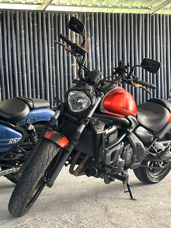 Karon Beach morning: surf, red flags, and parked motorcycles