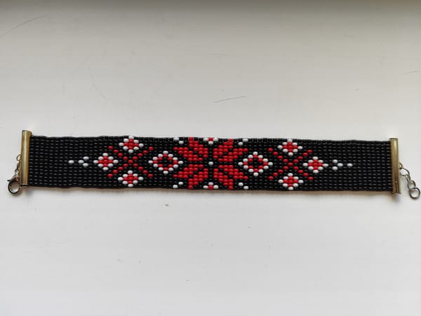 Everyday objects documented: bracelet, flowers, candy wrapper