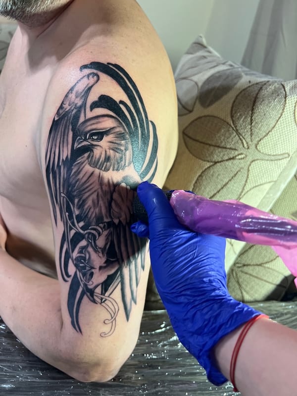 Tattoo artist creates bird designs in Smolyan Bulgaria