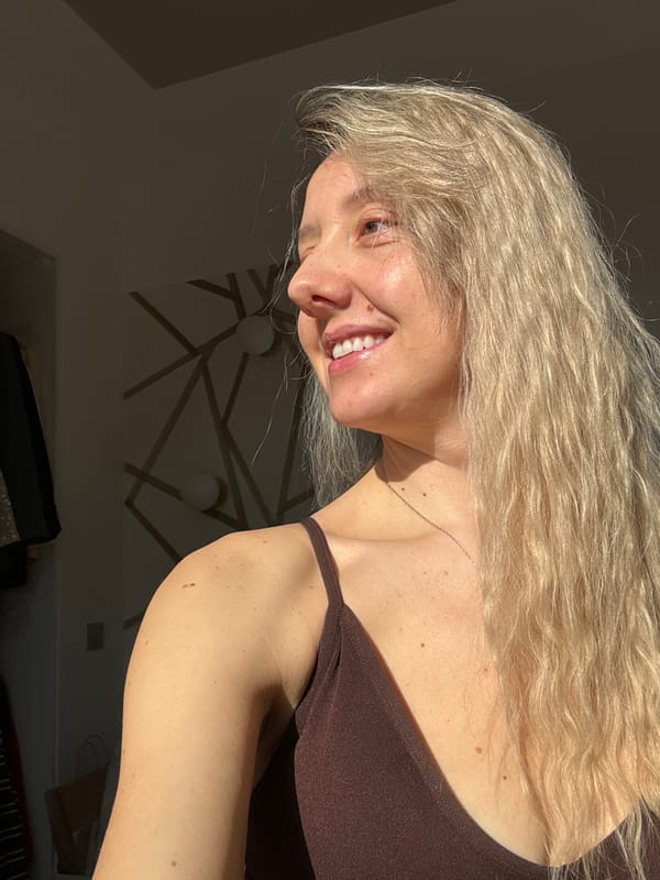 Woman takes mirror selfies during morning workout in Latvia