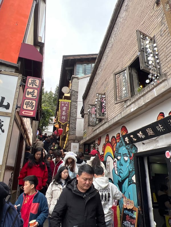 Daily life captured in Yuzhong District's decorated streets