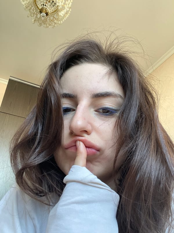 Young women take morning selfies in Moscow apartments