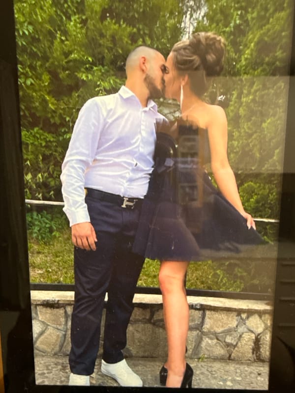 Couple's embrace and owl craft captured in brief timespan