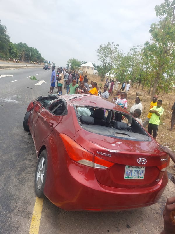 Severe car accident damages red sedan in Akwanga Nigeria