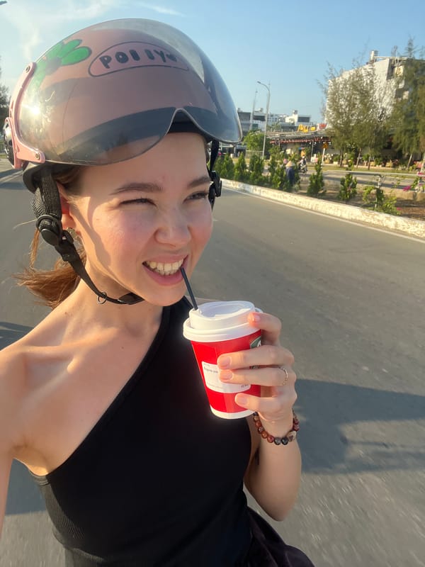 Woman captures joyful selfie while riding in Vietnamese heritage area