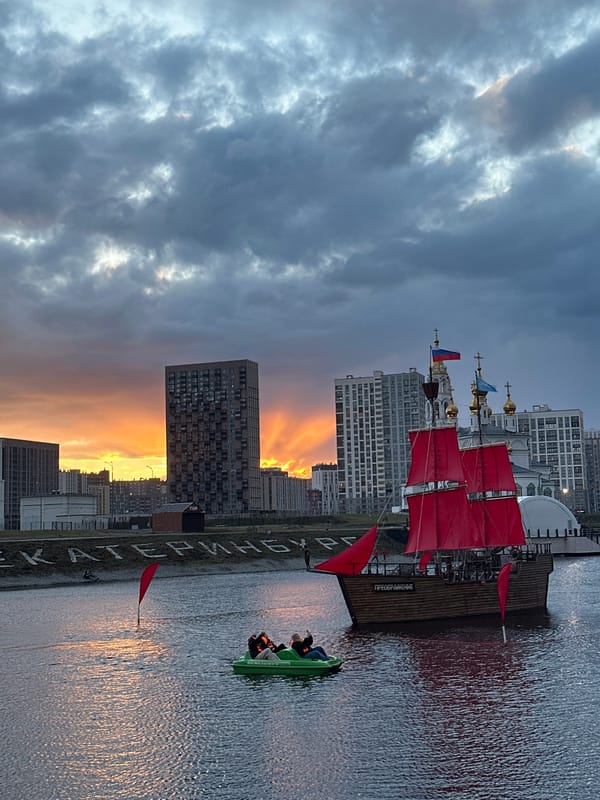 Red-sailed ship replica spotted on Yekaterinburg reservoir at twilight