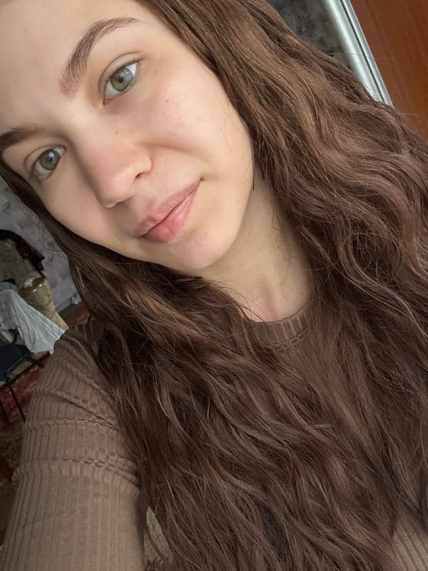 Woman takes morning selfies in Russian village home